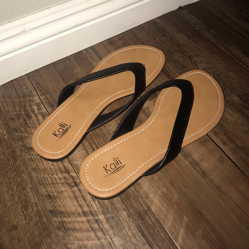 Black leather flip flop sandals